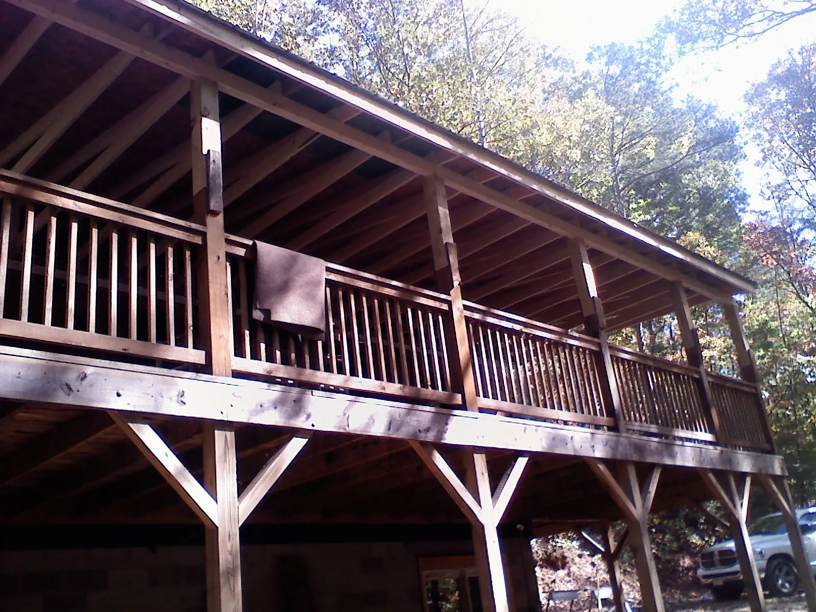 Timber framing under a new elevated porch and deck — Roof Leak Repair in Shawmut by Roofing Brothers